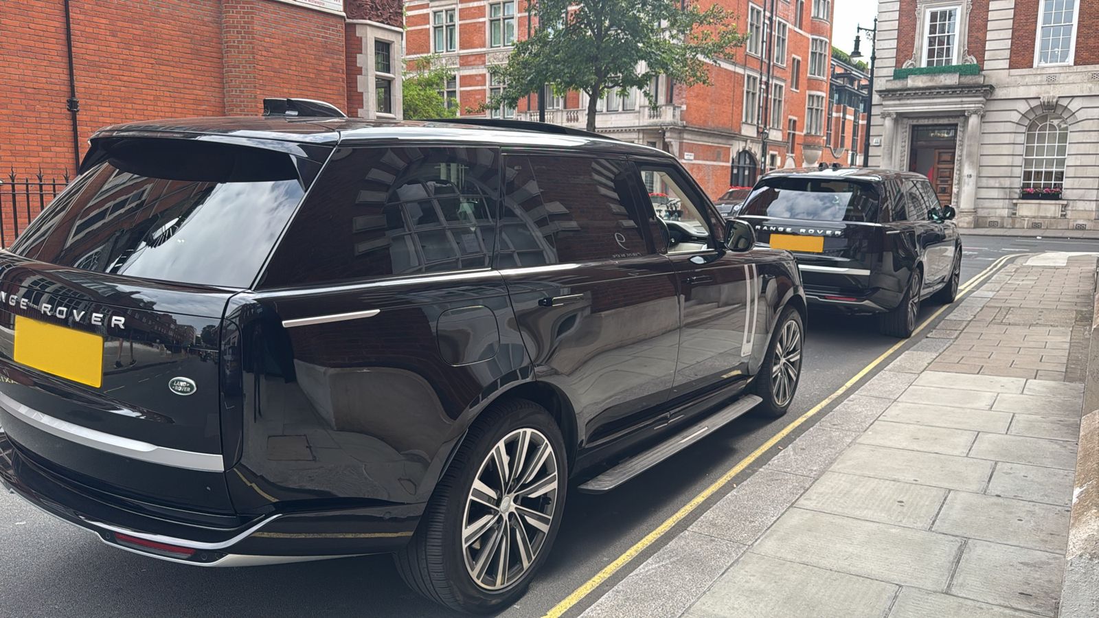 Range Rover LWB parked on a city street